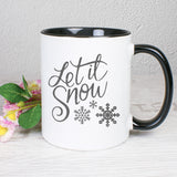 Tasse Weiß/Schwarz bedruckt mit Spruch: Let it snow - Motiv: Schneeflocken - Farbe: Schwarz