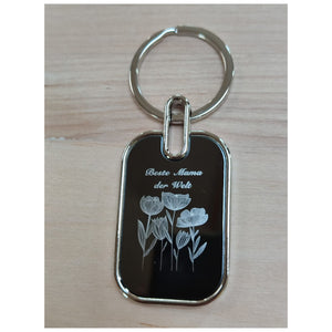 Ein wunderschöner Schlüsselanhänger graviert für die&nbsp;Beste Mama der Welt und Blumenmotiv