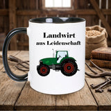 schwarz-weisse Tasse beidseitig bedruckt mit Traktor und Schriftzug Landwirt aus Leidenschaft