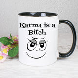 Tasse Weiß/Schwarz bedruckt mit Spruch: Karma is a Bitch - mit Smiley