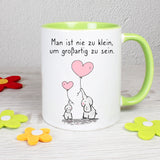 Tasse Weiß/Grün bedruckt mit Spruch: Man ist nie zu klein, um großartig zu sein - Motiv: Elefanten
