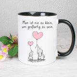 Tasse Weiß/Schwarz bedruckt mit Spruch: Man ist nie zu klein, um großartig zu sein - Motiv: Elefanten
