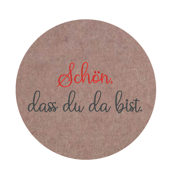 Filz Untersetzer rund bedruckt mit Schön, dass du da bist.