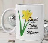 weisse Tasse mit Druck Narzisse mit Text: Engel ohne Flügel nennt man Mama.